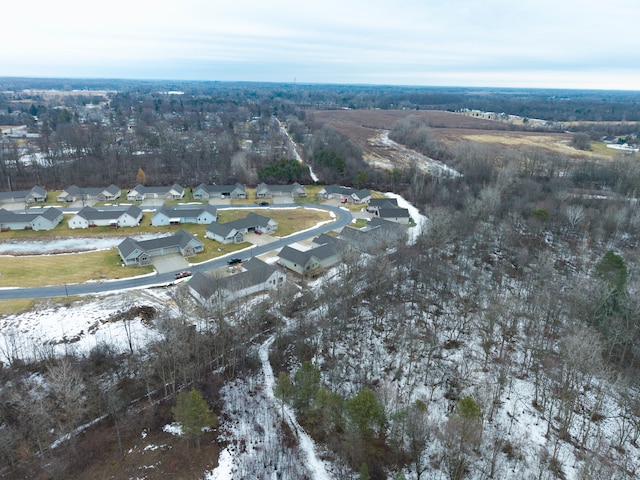 birds eye view of property with a residential view