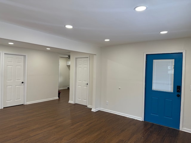 foyer entrance with dark hardwood / wood-style flooring