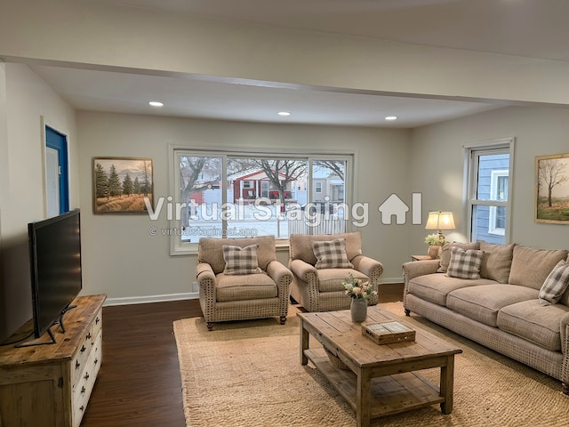 living room with dark hardwood / wood-style floors