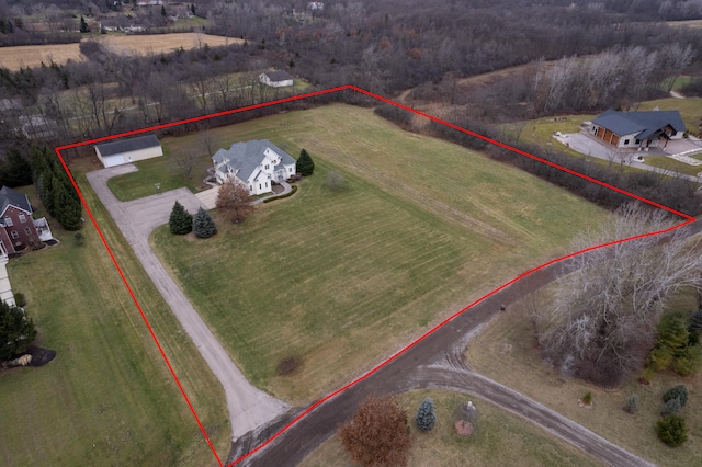 birds eye view of property featuring a rural view