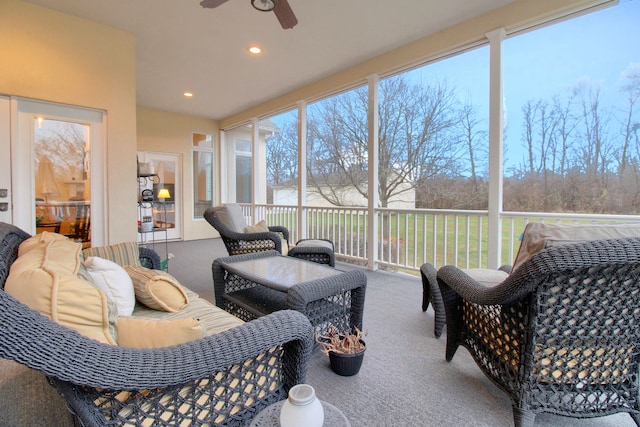 sunroom / solarium with ceiling fan