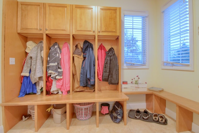 mudroom with light tile patterned flooring