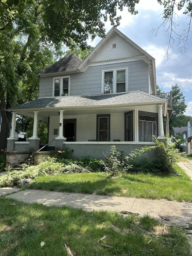 farmhouse inspired home with a porch