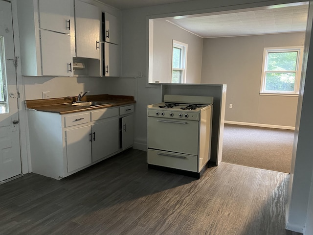 kitchen with dark wood-type flooring, white cabinetry, sink, and white range with gas stovetop