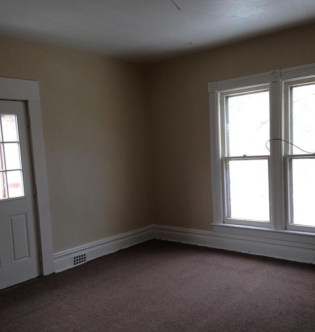 view of carpeted spare room