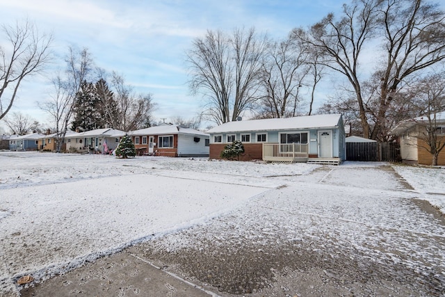 view of front of house with a storage shed