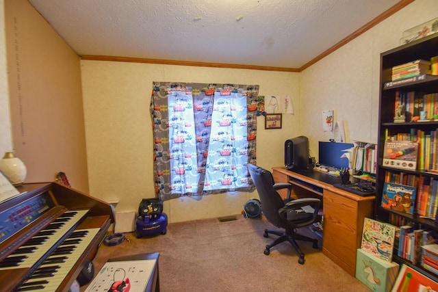 home office with carpet, a textured ceiling, and ornamental molding