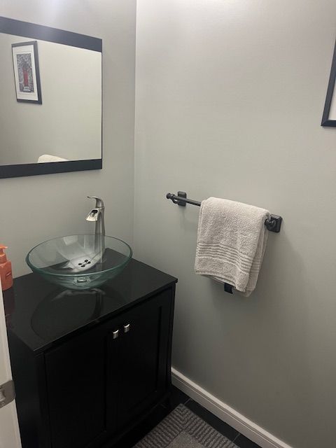 bathroom featuring vanity and tile patterned floors