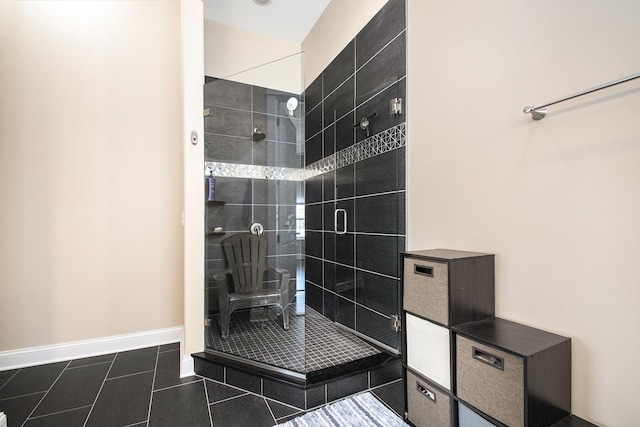 bathroom with a shower with shower door