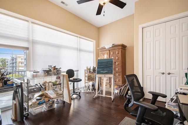 office space featuring ceiling fan and dark hardwood / wood-style floors