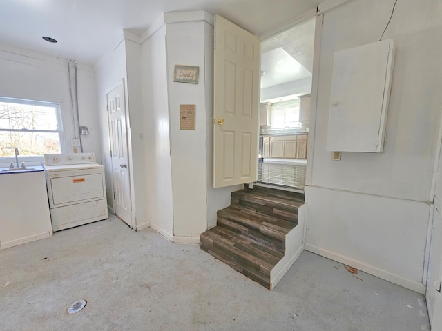 laundry room featuring sink and washer / clothes dryer