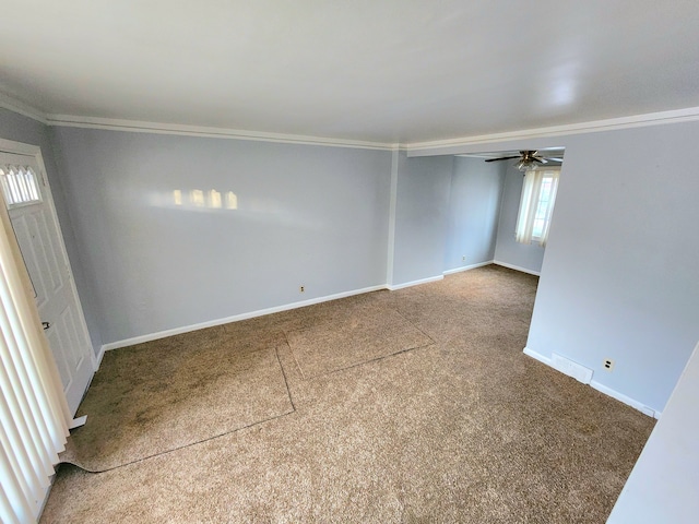 carpeted spare room with ornamental molding