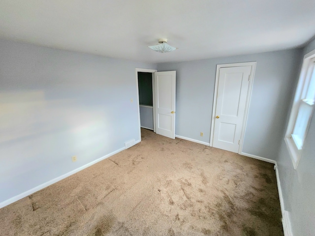 view of carpeted spare room