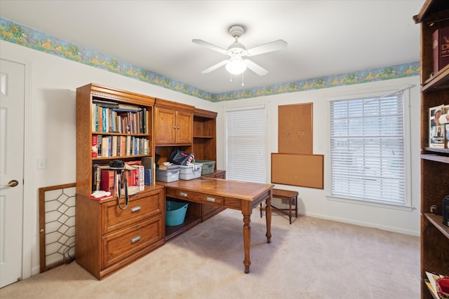 office area with light colored carpet and ceiling fan