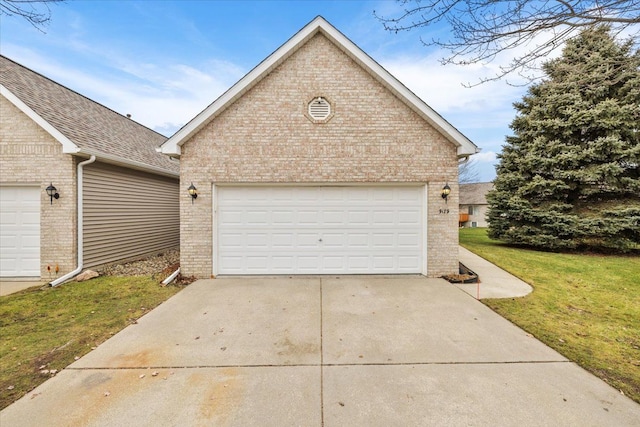 garage featuring a yard