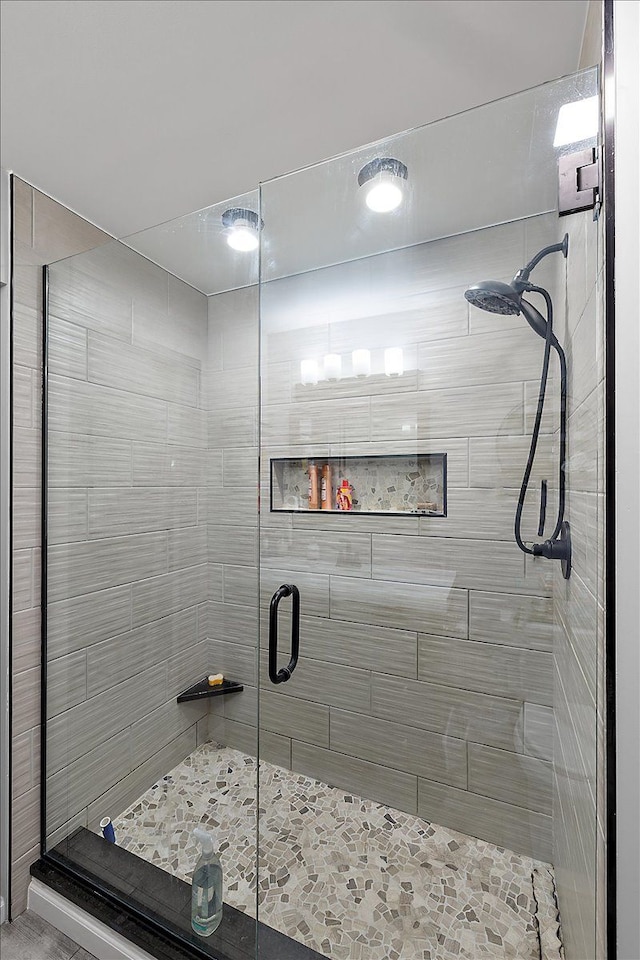 bathroom with an enclosed shower