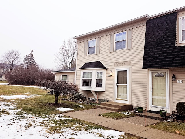 view of front of house with a lawn