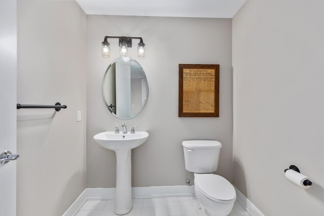 335 Bridge St NW Unit 2602, Grand Rapids, MI 49504 - bathroom with toilet and tile patterned floors