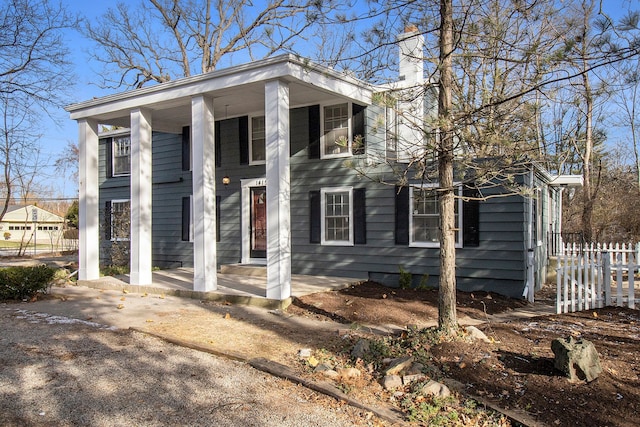 greek revival house with covered porch