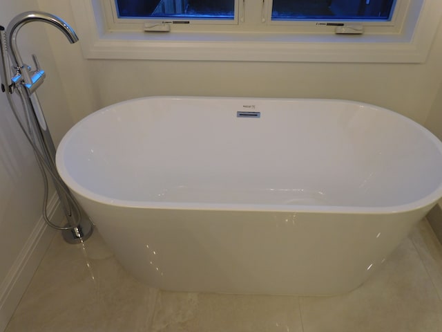 details featuring a freestanding bath