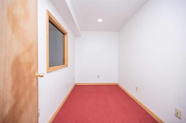 unfurnished room featuring carpet floors