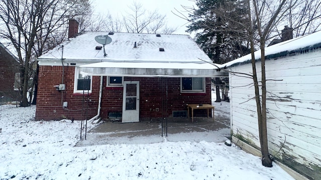 view of snow covered property