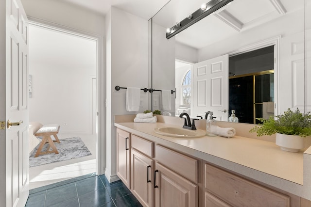 bathroom with tile patterned flooring, vanity, an enclosed shower, and beamed ceiling