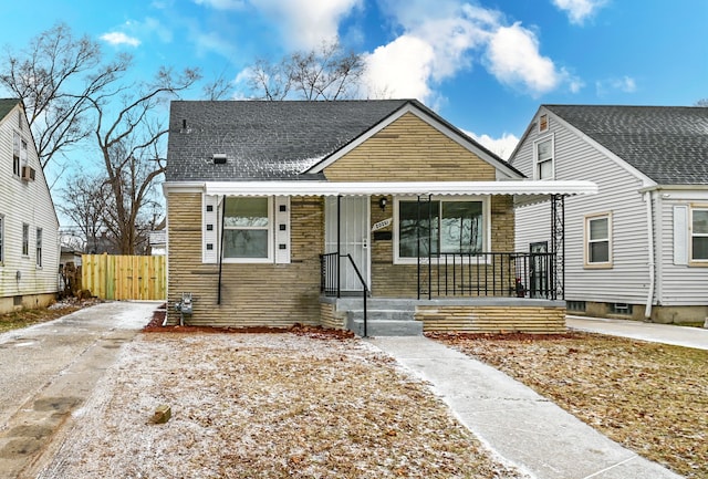 bungalow-style home with a porch