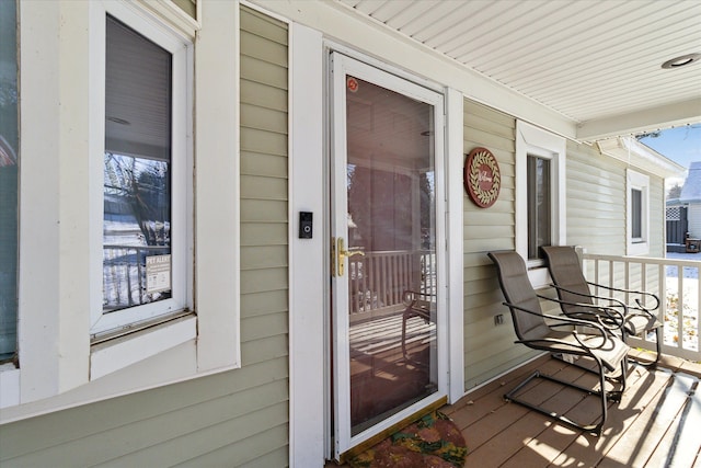 deck with covered porch