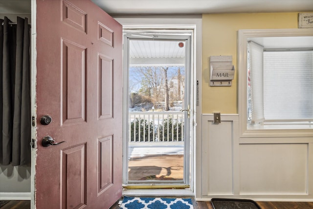 doorway to outside featuring dark hardwood / wood-style floors