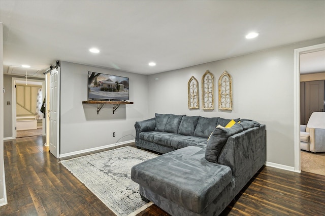 living room with dark hardwood / wood-style flooring