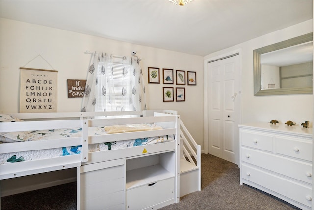 carpeted bedroom featuring a closet