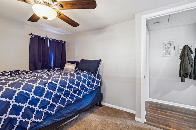 bedroom with hardwood / wood-style flooring and ceiling fan