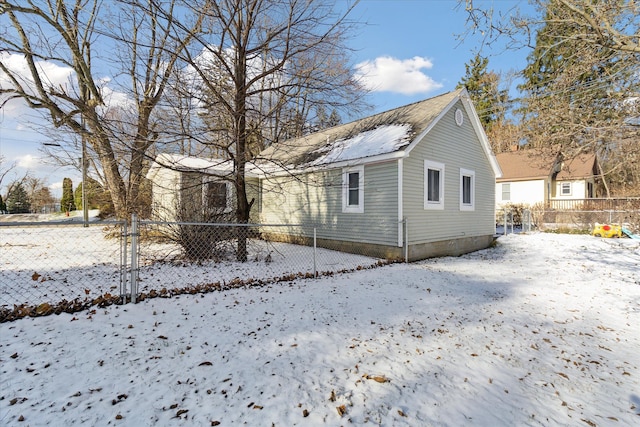 view of snow covered property