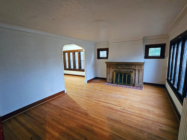 unfurnished living room with hardwood / wood-style floors