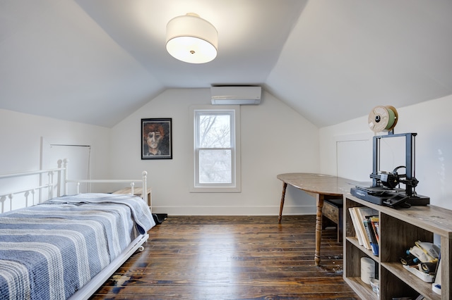 bedroom with dark wood-type flooring, a wall mounted AC, and vaulted ceiling