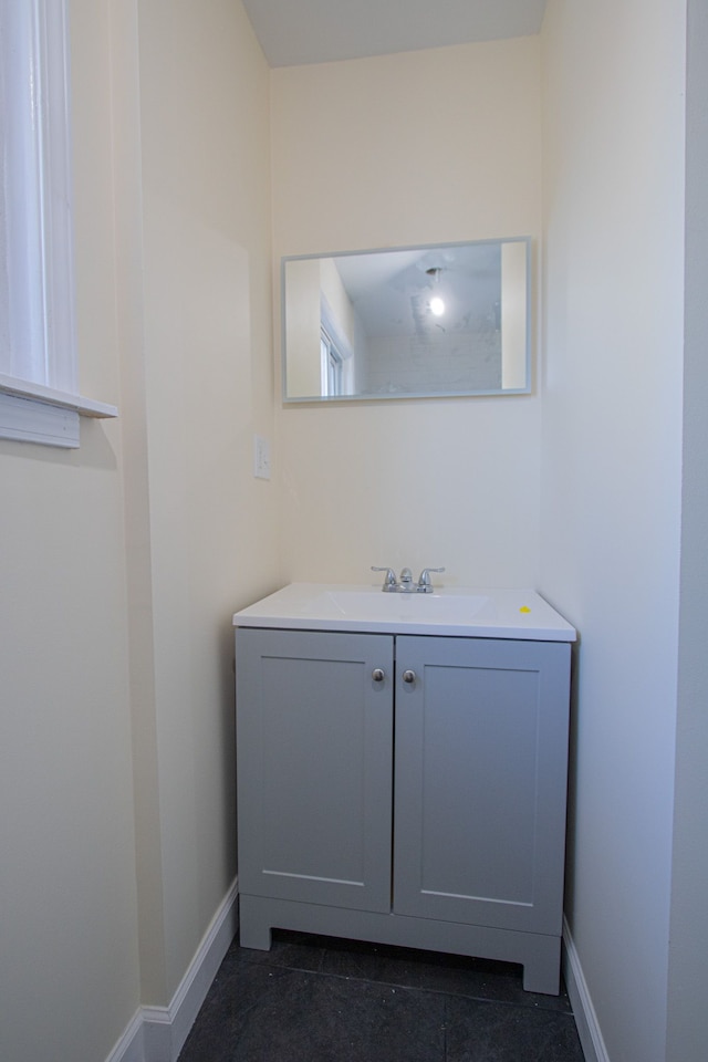 bathroom featuring tile patterned floors and vanity