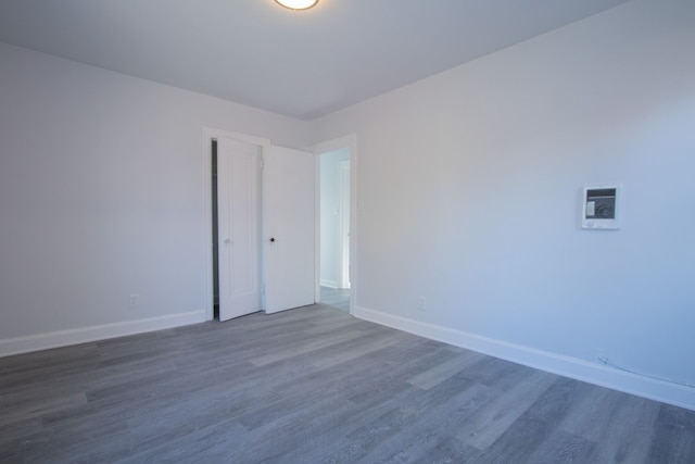 empty room featuring dark hardwood / wood-style floors