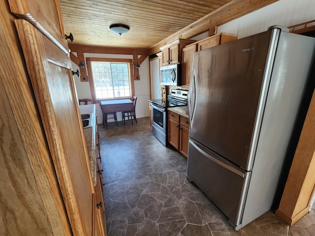 kitchen with wooden ceiling and stainless steel appliances