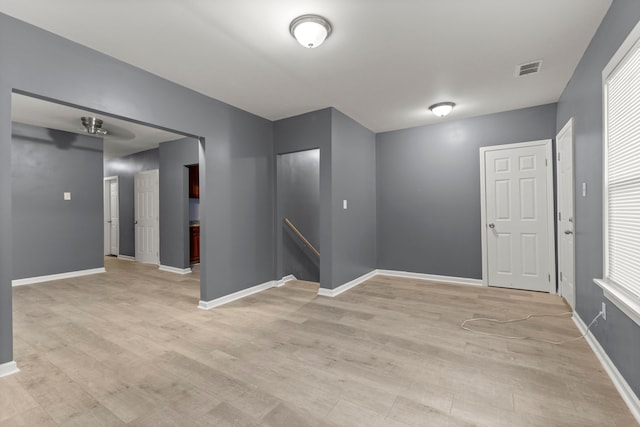 spare room featuring light hardwood / wood-style flooring