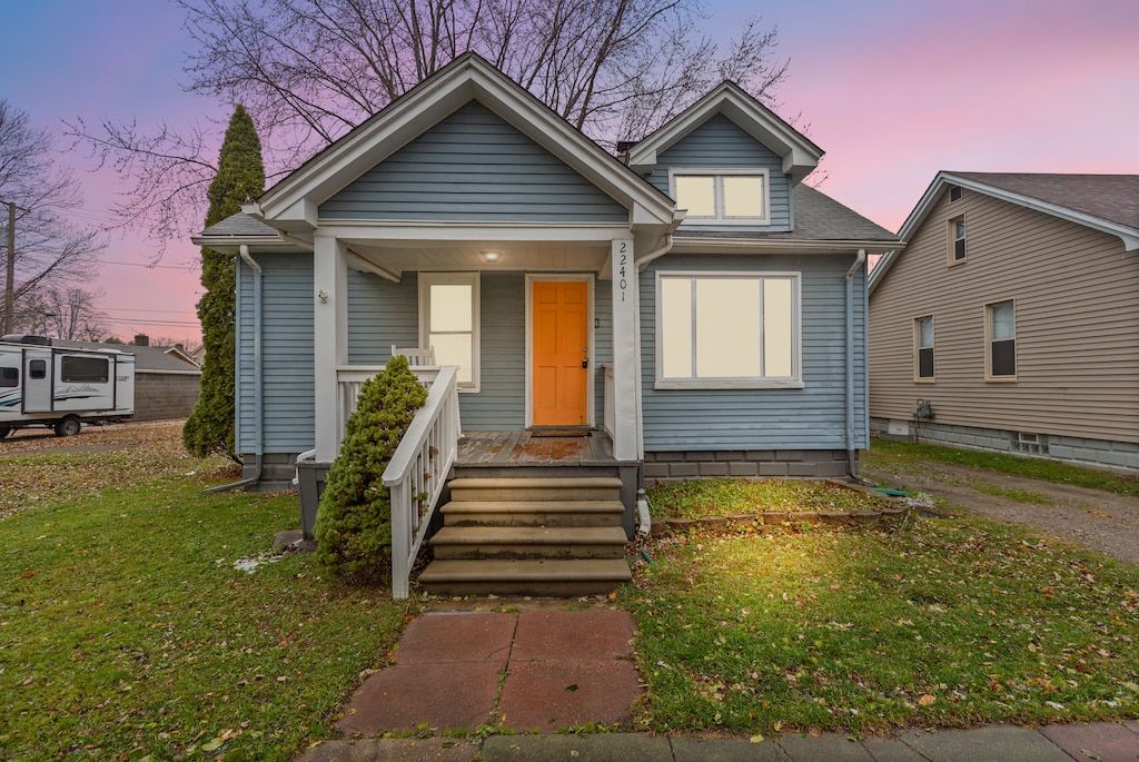 bungalow with a lawn