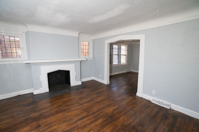 unfurnished living room featuring dark hardwood / wood-style floors