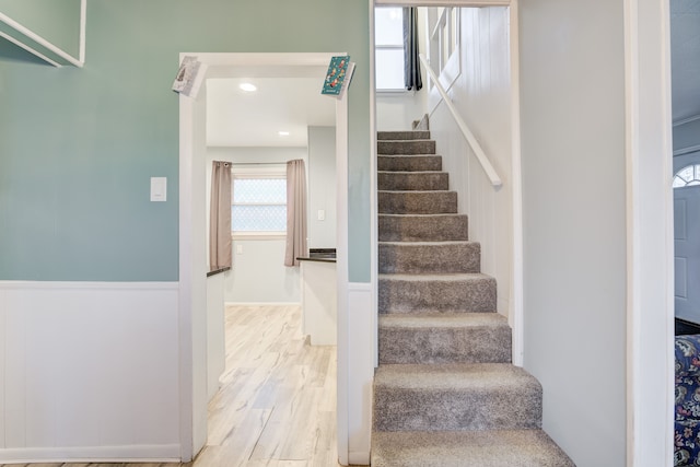 stairway with wood-type flooring