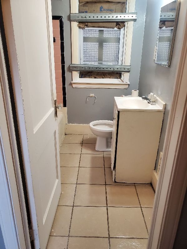 full bathroom with separate shower and tub, tile patterned flooring, vanity, and toilet