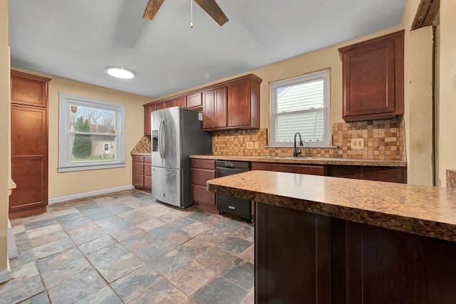 kitchen featuring decorative backsplash, stainless steel refrigerator with ice dispenser, black dishwasher, and sink