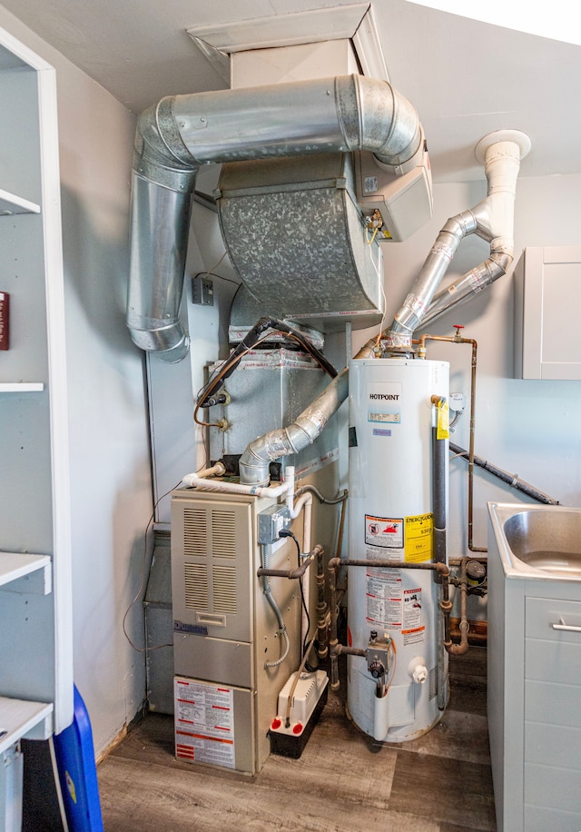 utility room with water heater