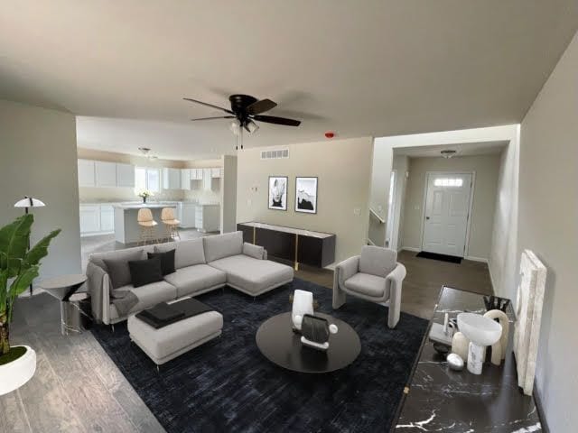 living room with ceiling fan