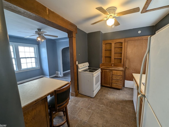 kitchen with ceiling fan and white appliances