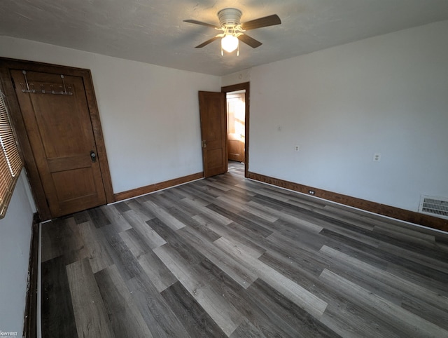 unfurnished room featuring ceiling fan and wood-type flooring