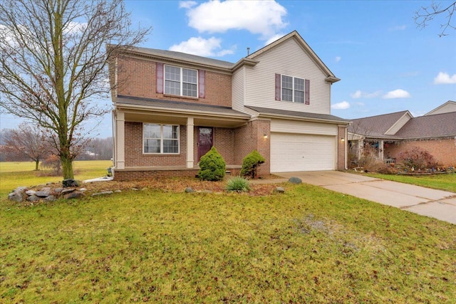 view of front of home featuring a garage and a front lawn